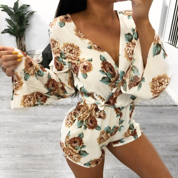 Boutique Dresses & Skirts - Laura's Boutique White Floral Romper